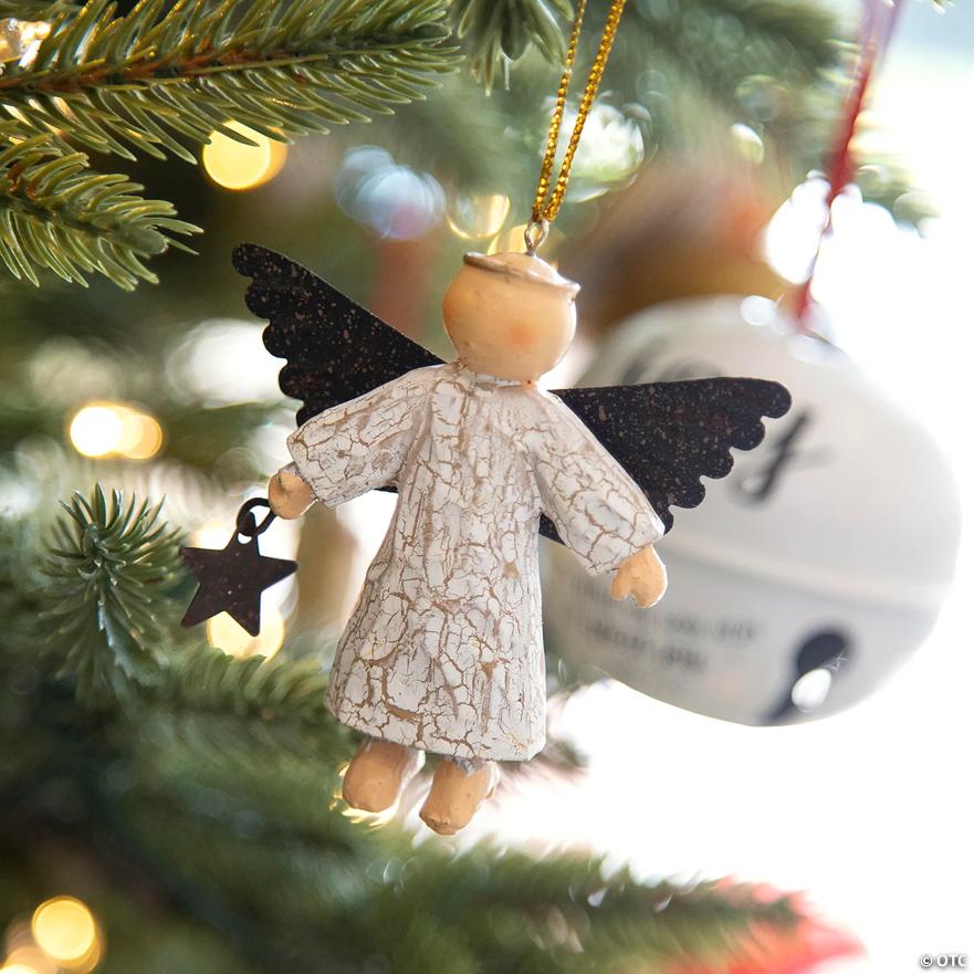 Angel ornament hanging on tree
