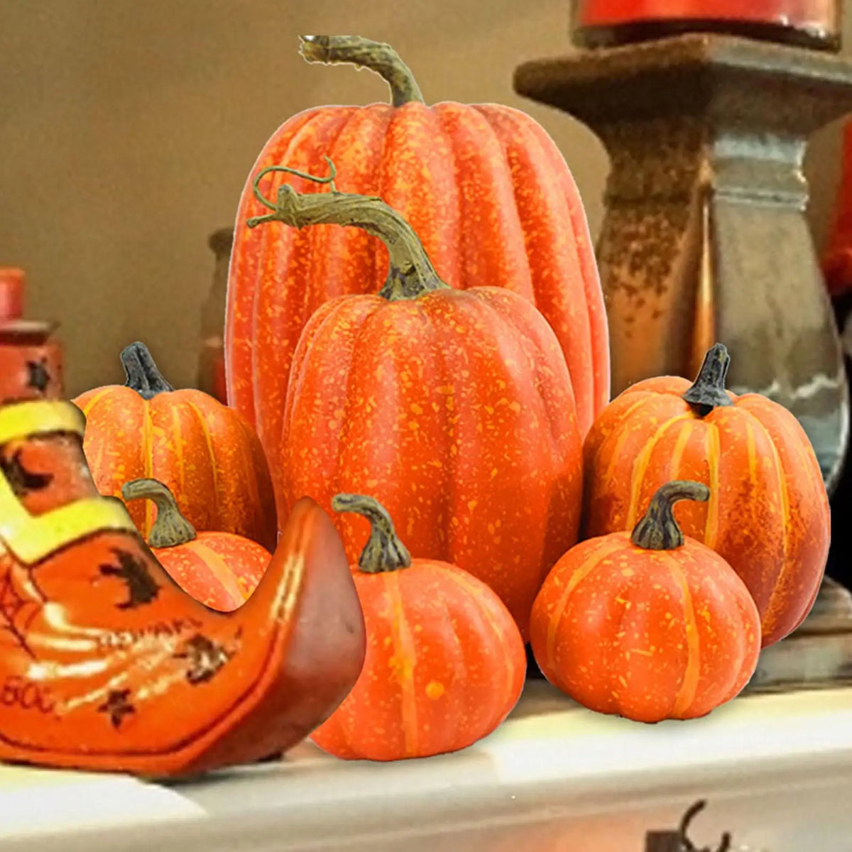 Set of seven artificial harvest pumpkins in assorted sizes